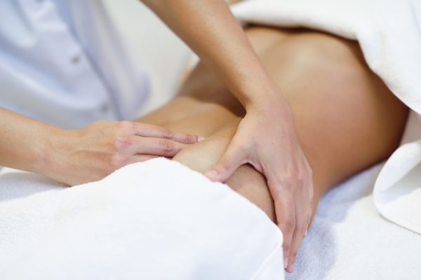 woman receiving belly massage spa salon.jpg2222