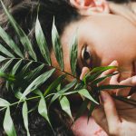 young brunette with leaves looking camera.jpg 2222